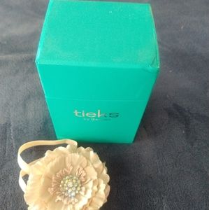 Empty Tieks Box and flower topper